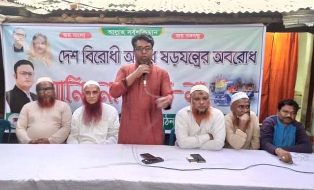 দেশ বিরোধী অবরোধের প্রতিবাদে হিলির রাজপথে পৌর আওয়ামীলীগ